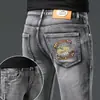 Pantalones vaqueros para hombre de marca italiana de alta gama y tendencia, colección otoño e invierno 2026, pantalones casuales ajustados elásticos en negro y gris con forro polar