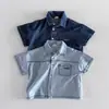 Traje de Mezclilla para Niños Atuendo de Verano de Moda Nuevo Estilo Fresco y Elegante Versátil Conjunto de Dos Piezas de Camisa de Manga Corta y Pantalones Cortos para Niños