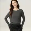 Camiseta básica de punto de cachemira pura para otoño e invierno, moderna y versátil para el trabajo, corte holgado, adelgazante, cuello redondo, manga larga de punto trenzado para mujer