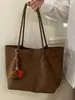 Yaozi 2026 otoño temprano nueva moda gamuza para ir al trabajo gran capacidad bolso tote casual simple versátil bolso de hombro