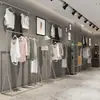 Estante de Exhibición para Tienda de Ropa Combinación Piso a Piso Perchas Plateadas para Hombres y Mujeres Estante Estante de Exhibición Montado en Pared
