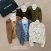 Ropa Hongmi/Otoño 2026 Nuevo Cárdigan de Punto de Lana Casual Estilo Francés de Cuello V Falso Dos Piezas