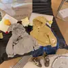 Sudadera Base Rayada con Capucha Mágica Otoño 2026 Estilo Coreano Suave y Amigable con la Piel del Bebé Suéter de Manga Larga