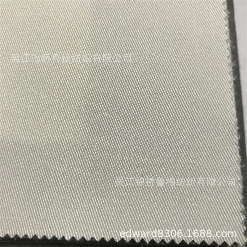 斜纹纱卡全涤21S10858本白.jpg