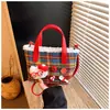 Bolsa Infantil 2026 Novo Estilo Coreano Xadrez Bordado de Gato Bolsa de Mão Bolsa Transversal Pai e Filho para Meninas Bolsa de Batom Transfronteiriça