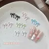 Accesorios de aleación para arte de uñas personalizados, moños macarrón, decoraciones metálicas para uñas portátiles DIY, venta al por mayor