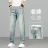 Jeans retro de alta gama para hombre de color claro para primavera, corte recto y holgado, nuevos pantalones para hombre elásticos lavados estilo primavera y otoño 2026
