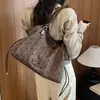 Bolsa de Ombro Única Grande Capacidade da Moda Feminina Verão 2026 Nova Bolsa de Ombro Única Casual Retro de Bolinhas Bolsa de Mão para o Trabalho