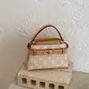 Moda Transfronteriza Versátil Gran Capacidad Primavera 2026 Nuevo Bolso de Hombro Cruzado de Moda con un Toque de Alta Gama y Bolso Cubo de Mano