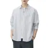 Camisa de hombre de tela Oxford a rayas estilo japonés 2026 nuevo otoño algodón puro cuello camisero manga larga chaqueta venta al por mayor