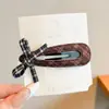 Pinza para el Cabello Melaleuca Otoño e Invierno para Mujer Lazo Estampado Leopardo Exquisita Pinza BB Accesorios para el Cabello Nuevo Estilo 2026 Pinza de Pato de Punto Versátil