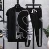 Traje de gofre de manga larga Primavera y Otoño Camiseta de manga larga Traje de hombre Cuello redondo Pantalones casuales Pantalones deportivos Ropa deportiva Hombres a la moda