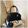 Bolsa de Mão Elegante e Versátil Bolsa Baguete para Mulheres 2026 Primavera Novo Estilo Alta Qualidade Casual Simples Bolsa de Ombro Transversal