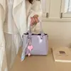 Bolsa Quadrada Pequena Fashionável Exquisita Estilo Coreano Nova Primavera Bolsa de Mão Transversal Feminina Bolsa de Ombro Versátil com Toque de Luxo PU
