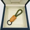 Fique Rico Imediatamente Pingente de Chaveiro de Couro de Vaca Feito à Mão para Carro Lanyard Elegante Simples Exquisito para Casais Masculinos e Femininos