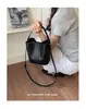 Elegante bolso tejido para mujer, nuevo modelo de moda 2026, bolso retro para el día a día, bolso de hombro y cruzado transfronterizo