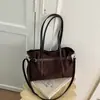 Bolso de gamuza vintage de alta gama para mujer, nuevo modelo 2026, bolso tote de gran capacidad, bolso versátil para el hombro para el día a día, comercio exterior