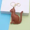 Stock de fábrica Estilo Coreano Llavero de Gato de Cuero PU Doble Cara Encanto Sencilla de Bolso Nicho Regalo para Pareja Mejor Amigo