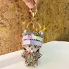 Llavero Creativo Lindo de Muñeca Coreana con Incrustaciones de Diamante para Coche Colgante de Bolsa de Coche de Pareja de Dibujos Animados para Mujer Venta al por Mayor