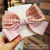 Accesorios para el cabello de otoño e invierno para niños, estilo Chanel con lazo, nuevos pasadores, tela de cuadros dulce, accesorios para el cabello al por mayor