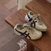 Zapatillas de entrenamiento retro alemanas para niños 2026 nuevo modelo primavera y otoño con bloques de color con cordones zapatillas casuales transpirables de verano zapatillas deportivas versátiles