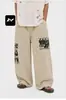 Pantalones vaqueros color albaricoque con graffiti de banda punk retro americana, unisex, nicho, holgados, de pierna recta, pantalones largos casuales
