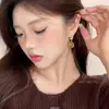 Pendientes Maillard de Gota de Agua Ojo de Tigre para Mujer 2025 Nuevo Estilo Popular Pendientes Retro de Celebridad de Internet Pendientes de Temperamento de Gama Alta
