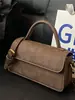 Nova Bolsa Feminina Outono 2025 Moda Textura Retrô Cor Pura Simples e Requintada Bolsa Carteiro de Ombro Único Transversal Pequena Quadrada para Mulheres