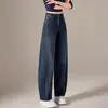 Jeans acampanados retro azules de cintura alta para mujer, con un diseño curvo de pierna ancha que crea un efecto adelgazante, perfectos para el uso casual de otoño, con una silueta holgada y fluida