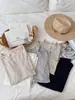 Camiseta básica de lino Tencel para mujer con bolsillos, top de cuello redondo, nueva blusa Lyocell amigable con la piel para primavera/verano, camiseta básica de manga larga