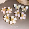 Pendientes de Flor Mariposa con Goteo de Aceite de Circonita Brillante Estilo Nuevo 2026 Pendientes Exquisitos de Estilo Dulce Accesorios para Orejas de Lujo Ligero
