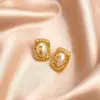 Set de Aretes de Perla con Borde Dorado Ovalados, Estilo Otoño e Invierno, Pendientes Elegantes de Gama Alta Retro de Hong Kong al por Mayor