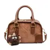 Bolsa Satchel de Camurça Estilo Retrô Bolsa Almofada para Mulheres 2025 Inverno Nova Moda Versátil Design de Nicho Bolsa Transversal Tendência