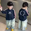 Camiseta de manga larga 100% algodón para niños, colección de otoño, camiseta interior de manga raglán, top fresco y elegante para niños mayores, camiseta con patchwork, moderna