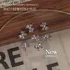 Accesorios de uñas con circonitas y lazos, productos brillantes con acabado brillante, diamantes de imitación para uñas con lazo de perlas para manualidades, venta al por mayor de pequeños accesorios.