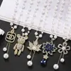 Collar de Perlas de Camelia que Gotea Aceite Nueva Moda para Mujer Exquisita Cadena Larga para Suéter Colgante Versátil de Ropa de Alta Gama