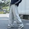 Pantalones casuales largos de otoño ligeros de estilo americano de moda para hombre, corte holgado, versátiles, de pierna ancha recta, con caída, pantalones deportivos de chándal de moda.
