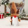 Nuevas decoraciones navideñas transfronterizas Paquete de regalo navideño Adornos de muñeco de pie de anciano Adornos de escritorio de muñeco sin rostro