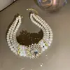 Traje de collar y pendientes de diamante ovalado europeo y americano exagerado luz de lujo alta gama cadena de clavícula nicho moda joyería al por mayor