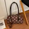 Bolso de hombro de lunares de alta gama transfronterizo, de nicho, con un diseño color-block fresco, dulce y elegante, perfecto como bolso de mano casual, moderno y chic.