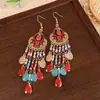 Pendientes grandes de flor estilo resort junto al mar, artículo de venta caliente de rafia, pendientes de botón de estrella de mar de lujo ligero de alta gama, pendientes de nicho y elegantes