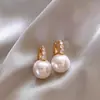 2025 Novo Estilo Brincos de Pérola para Afinar o Rosto Redondo de Luxo Leve para Mulheres Brincos de Temperamento de Alta Qualidade Brincos de Design de Nicho Atacado