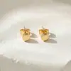 Aretes de Tuerca Geométricos de Estrella de Acero Titanio con Bolas de Acero Grandes y Pequeñas de Moda Simple al por Mayor de Fábrica de Venta Caliente Aretes Perforados Mujeres