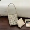Bolso tipo cubo tejido de patrón versátil transfronterizo para mujer, nuevo modelo 2026, bolsa popular de gran capacidad para madre e hija, bolso de hombro para debajo del brazo