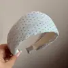 Diadema de lunares estilo coreano de ala ancha para mujer, adecuada para el uso diario, diadema de copa alta, pinza para el pelo simple para lavarse la cara, accesorio para el cabello versátil