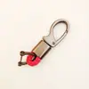 Acessórios para Carro Chaveiro de Metal Bolsa para Chaves Masculina Logo Criativo de Carro Corda Trançada à Mão Gancho de Fivela de Ferradura Entrega de Presente