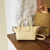 Bolso de Diseño Nicho Estilo Coreano Bolso Dumpling para Mujer 2026 Verano Nueva Moda Versátil Bolso de Hombro Cruzado Tote
