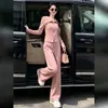 Traje casual da moda para mulheres, novo estilo outono e inverno 2026, modelagem slim, rejuvenescedor, conjunto de duas peças com moletom com zíper e gola azul-marinho e calça de perna larga