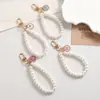 Nuevo Cordón para Teléfono Móvil Pulsera de Perlas Mariposa para Mujer Ins Moda Simple Boutique Pequeño Aroma Cadena de Perlas Hecha a Mano