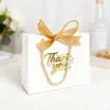Bolsa de Mão com Laço de Caixa de Papel Transfronteiriça, Portátil e Fácil de Carregar, Embalagem de Lembrança/Caixa de Presente para Doces Atacado